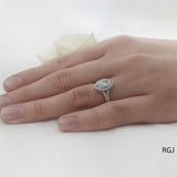 The Skye Saturn Platinum 0.45ct Marquise Cut Diamond Engagement Ring With 0.31ct Diamond Halo And Diamond Set Split Shoulders