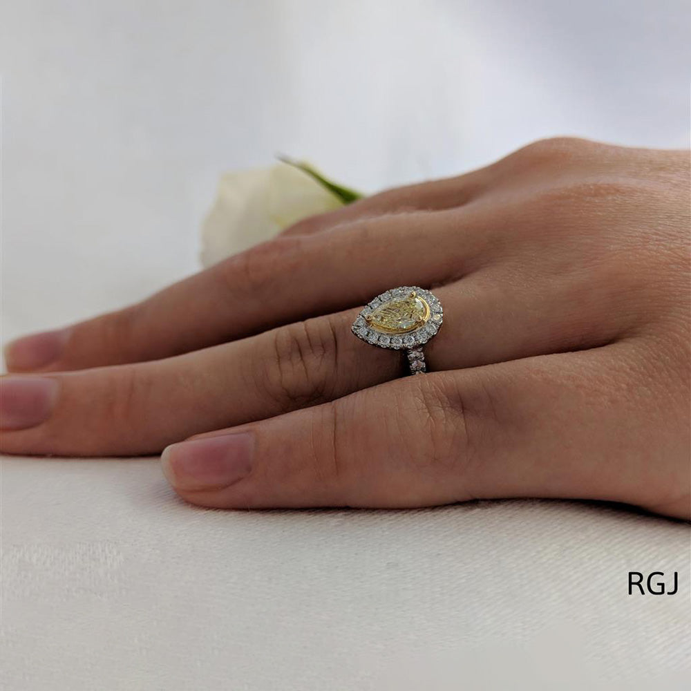 The Skye Platinum 0.39ct Pear Cut Yellow Diamond Engagement Ring With 0.27ct Diamond Halo And Diamond Set Shoulders