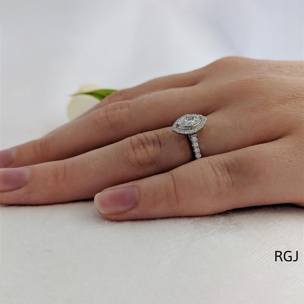 The Skye Platinum 0.31ct Marquise Cut Diamond Engagement Ring With 0.27ct Diamond Halo And Diamond Set Shoulders