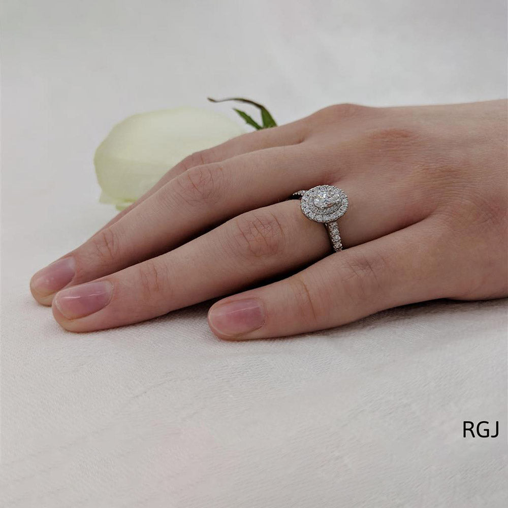 The Skye Duo Platinum 0.30ct Oval Cut Diamond Engagement Ring With 0.40ct Double Diamond Halo And Diamond Set Shoulders