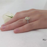 The Skye Platinum 0.71ct Oval Cut Yellow Diamond Engagement Ring With 0.33ct Diamond Halo And Diamond Set Shoulders