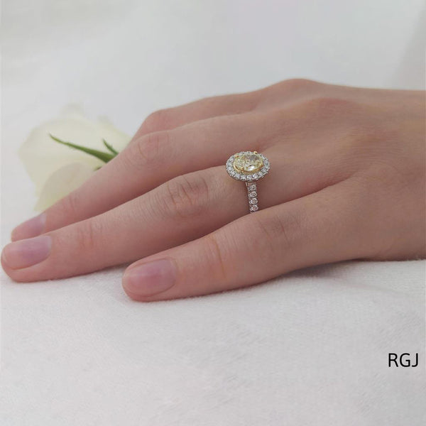 The Skye Platinum 0.71ct Oval Cut Yellow Diamond Engagement Ring With 0.33ct Diamond Halo And Diamond Set Shoulders