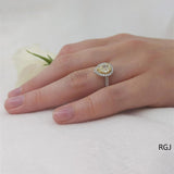 The Skye Platinum 0.57ct Pear Cut Yellow Diamond Engagement Ring With 0.33ct Diamond Halo And Diamond Set Shoulders