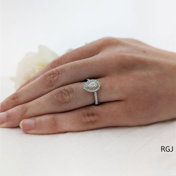 The Skye Duo Platinum 0.31ct Pear Cut Diamond Engagement Ring With 0.35ct Pink And White Diamond Halo And Diamond Set Shoulders