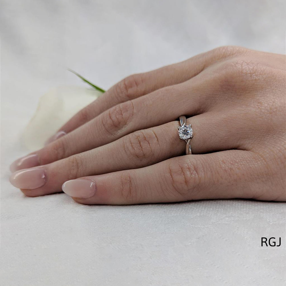 The Rona Four Claw Platinum 0.40ct Round Brilliant Cut Diamond Solitaire Engagement Ring With 0.04ct Diamond Detailing