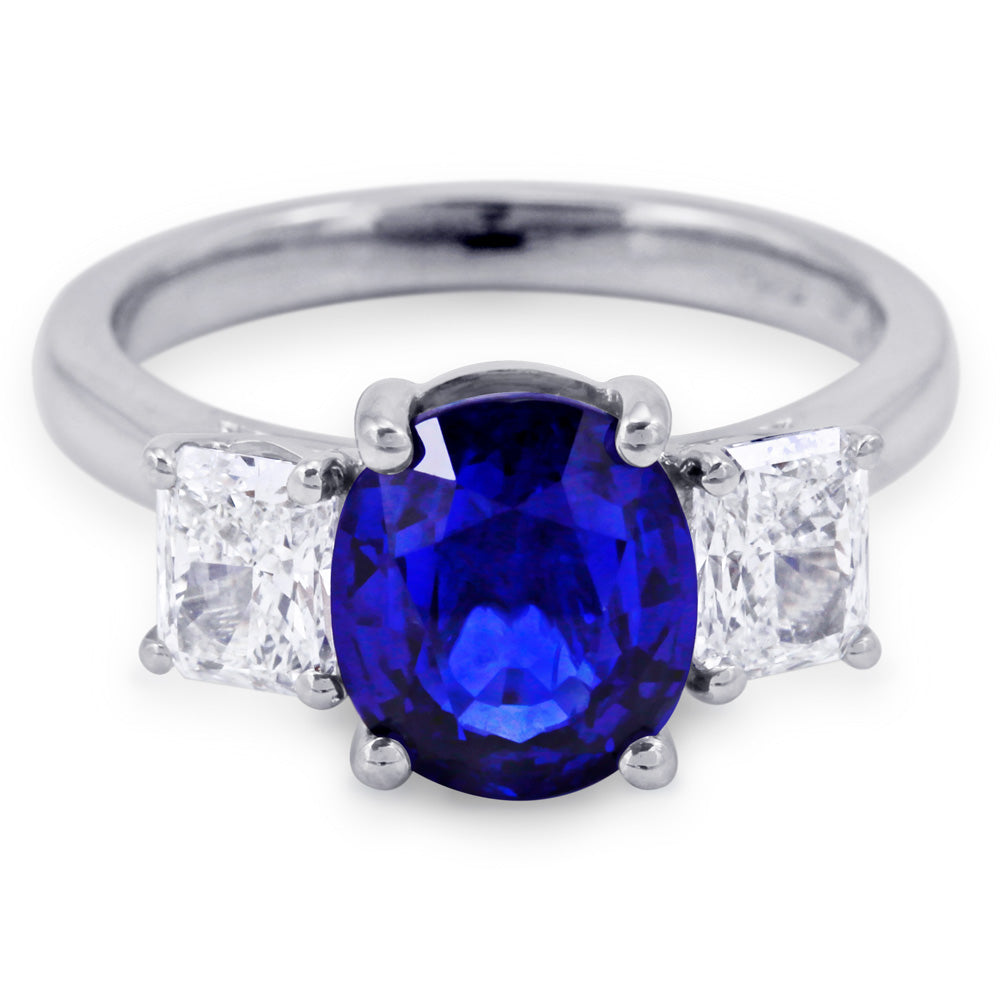Platinum 3.16ct Oval Cut Sapphire And 1.06ct Radiant Cut Diamond Three Stone Ring