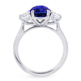 Platinum 3.16ct Oval Cut Sapphire And 1.06ct Radiant Cut Diamond Three Stone Ring