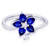 18ct White Gold 0.99ct Sapphire And 0.12ct Diamond Flower Ring