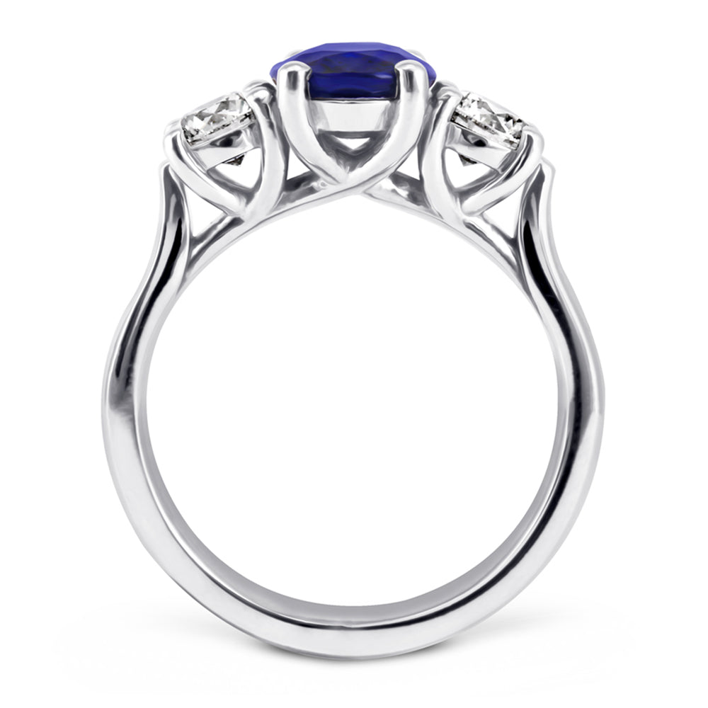 The Larkspur Platinum 2.14ct Oval Sapphire and 0.80ct Diamond Three Stone Engagement Ring