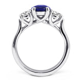 The Larkspur Platinum 2.14ct Oval Sapphire and 0.80ct Diamond Three Stone Engagement Ring