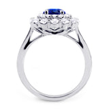 18ct White Gold 2.30ct Oval Cut Blue Sapphire And 1.09ct Double Diamond Halo Ring