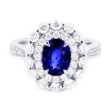 18ct White Gold 2.30ct Oval Cut Blue Sapphire And 1.09ct Double Diamond Halo Ring