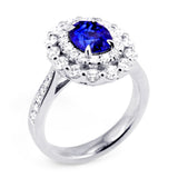 18ct White Gold 2.30ct Oval Cut Blue Sapphire And 1.09ct Double Diamond Halo Ring
