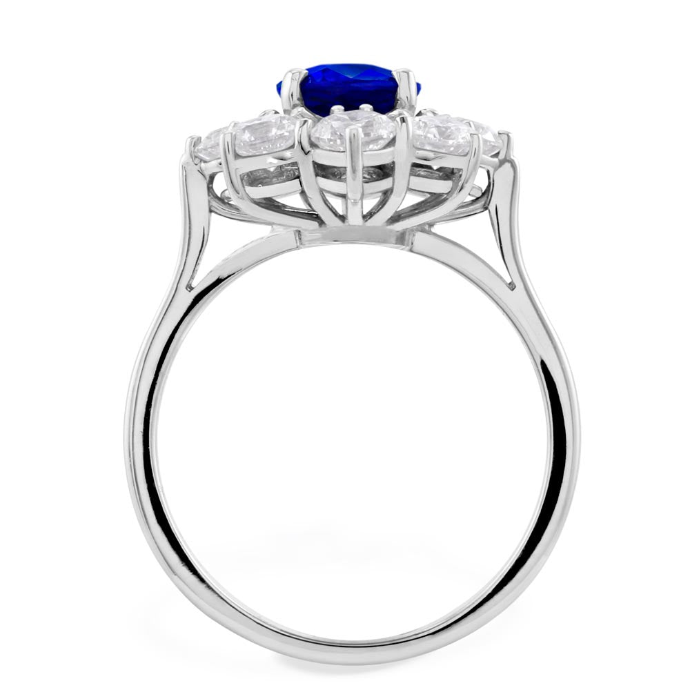 18ct White Gold 1.70ct Oval Cut Blue Sapphire And 1.65ct Round Brilliant Cut Diamond Halo Cluster Ring