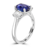 Platinum 2.63ct Oval Cut Sapphire And 0.63ct Diamond Three Stone Engagement Ring