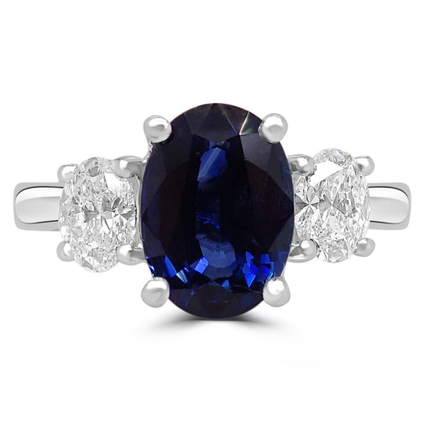 Platinum 2.63ct Oval Cut Sapphire And 0.63ct Diamond Three Stone Engagement Ring