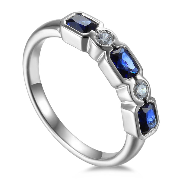 18ct White Gold 0.89ct Octagon Cut Blue Sapphire And 0.11ct Round Brilliant Cut Diamond Five Stone Ring