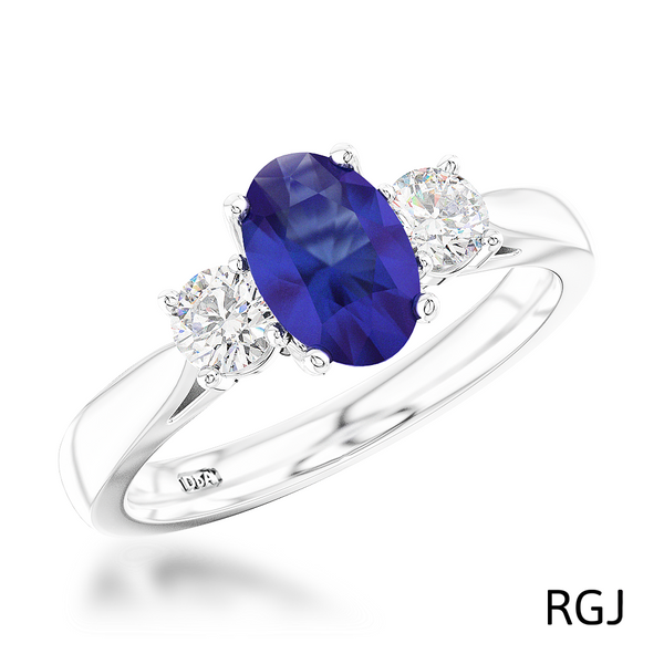 The Royal Platinum 1.48ct Oval Cut Blue Sapphire And 0.58ct Round Brilliant Cut Diamond Three Stone Ring