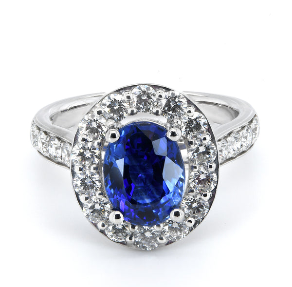 Platinum 2.52ct Oval Cut Blue Sapphire Ring With 1.24ct Diamond Halo And Diamond Set Shoulders