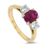 18ct Yellow And White Gold 0.88ct Oval Cut Ruby And 0.37ct Round Brilliant Cut Diamond Three Stone Ring