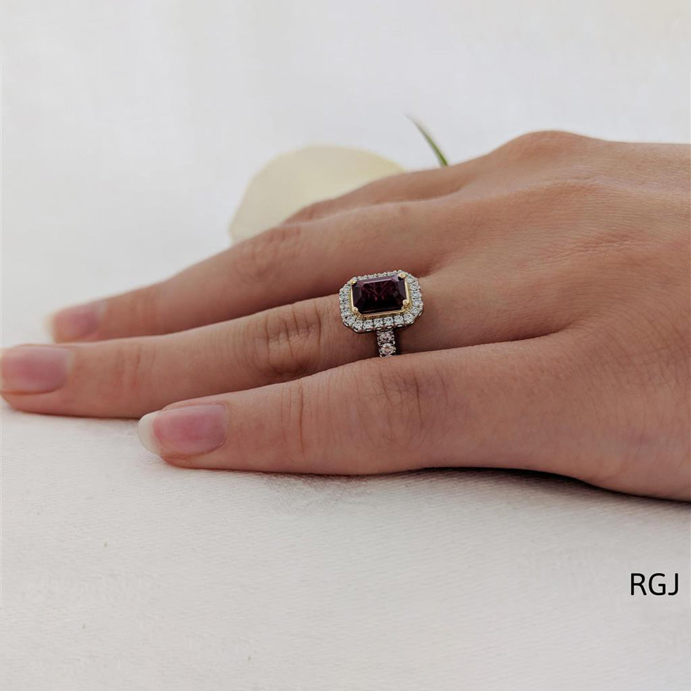 The Skye Platinum 1.15ct Emerald Cut Ruby Ring With 0.41ct Diamond Halo And Diamond Set Shoulders