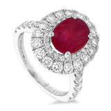 Platinum 1.93ct Oval Cut Ruby Ring With 1.26ct Double Diamond Halo And Diamond Set Shoulders