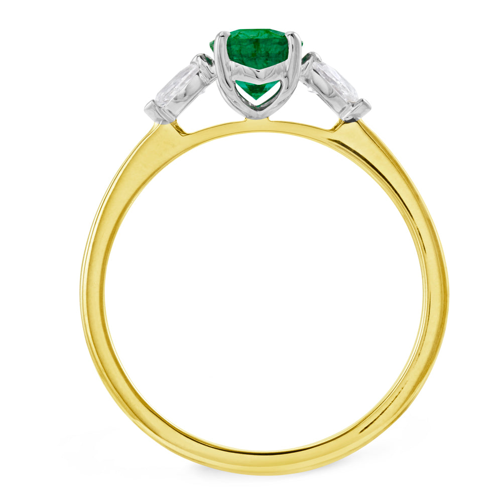 Platinum And 18ct Yellow Gold 0.78ct Oval Cut Emerald And 0.27ct Pear Cut Diamond Three Stone Engagement Ring