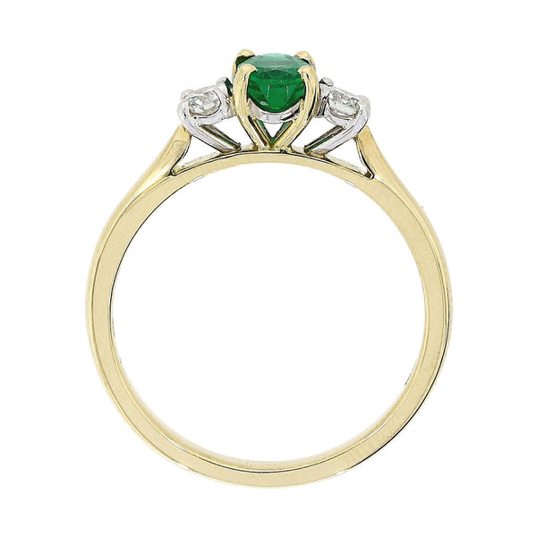 18ct Yellow And White Gold 0.65ct Oval Cut Emerald And 0.27ct Round Brilliant Cut Diamond Three Stone Engagement Ring