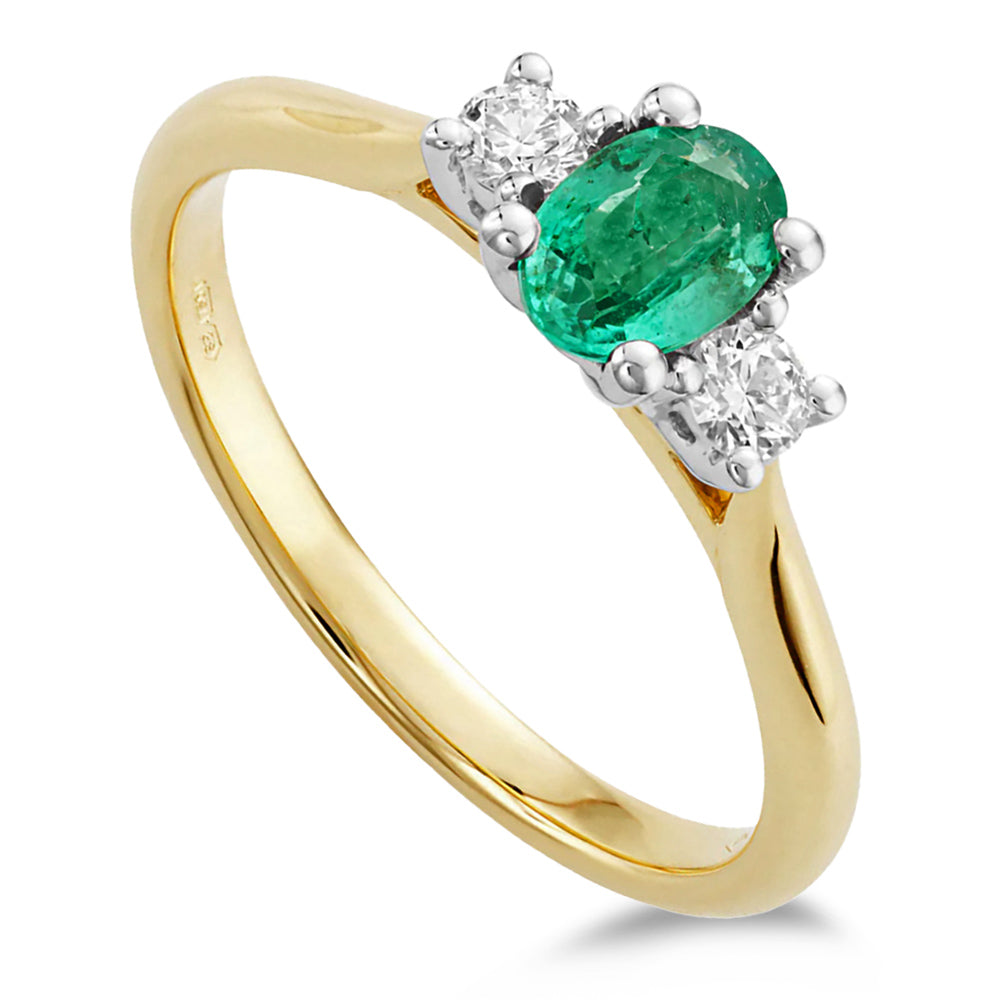18ct Yellow And White Gold 0.45ct Oval Cut Emerald And 0.16ct Round Brilliant Cut Diamond Three Stone Ring