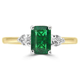 18ct Yellow Gold And Platinum 0.50ct Emerald Cut Emerald And 0.28ct Pear Cut Diamond Three Stone Engagement Ring