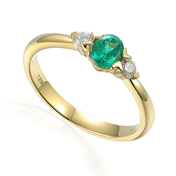 18ct Yellow Gold 0.44ct Oval Cut Emerald And 0.13ct Round Brilliant Cut Diamond Three Stone Ring