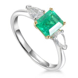 Platinum 0.86ct Octagon Cut Emerald And 0.38ct Pear Cut Diamond Three Stone Ring