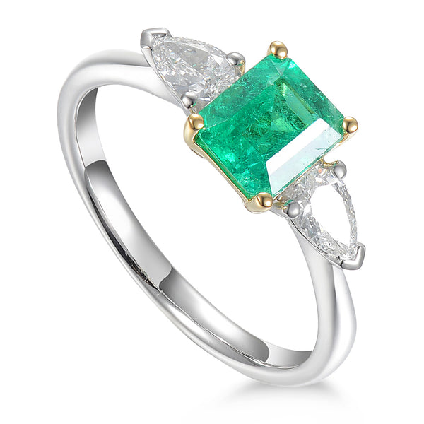 Platinum 0.86ct Octagon Cut Emerald And 0.38ct Pear Cut Diamond Three Stone Ring