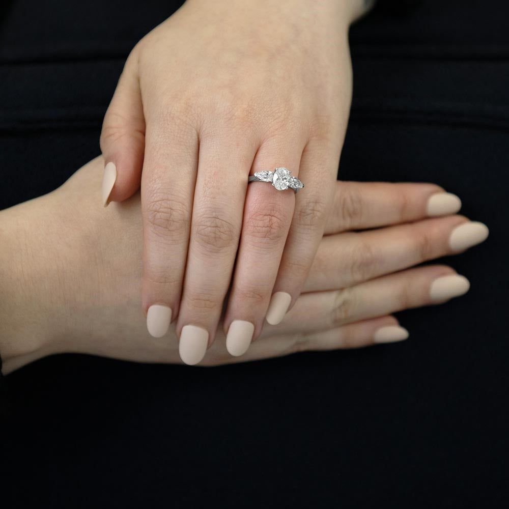Platinum 2.25ct Oval And Pear Cut Laboratory Grown Diamond Three Stone Engagement Ring