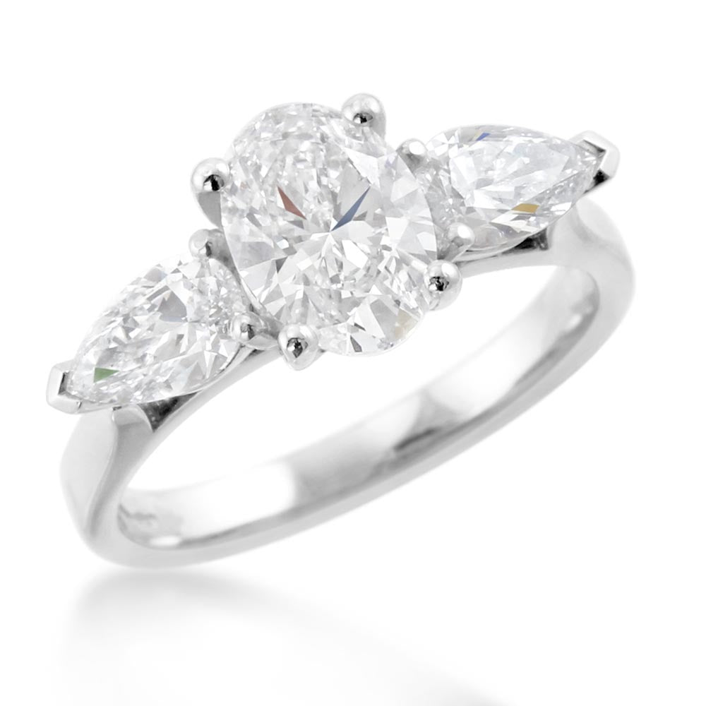 Platinum 2.25ct Oval And Pear Cut Laboratory Grown Diamond Three Stone Engagement Ring