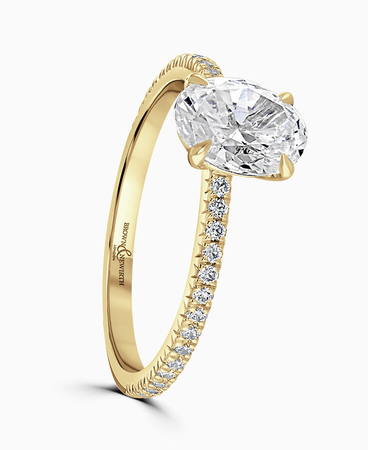 18ct Yellow Gold Laboratory Grown 1.06ct Oval Cut Diamond Solitaire Engagement Ring With 0.19ct Diamond Set Shoulders