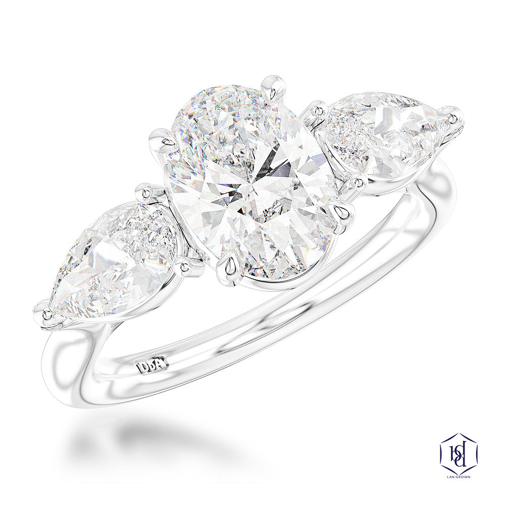Platinum 1.04ct Oval And 0.62ct Pear Cut Laboratory Grown Diamond Three Stone Engagement Ring