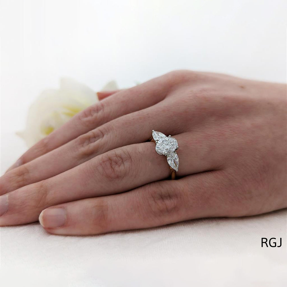 18ct Yellow Gold 1.00ct Oval And 0.57ct Pear Cut Laboratory Grown Diamond Three Stone Engagement Ring