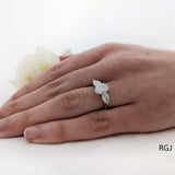 18ct Yellow Gold 1.00ct Oval And 0.57ct Pear Cut Laboratory Grown Diamond Three Stone Engagement Ring