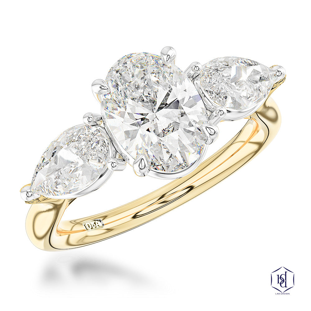 18ct Yellow Gold 1.00ct Oval And 0.57ct Pear Cut Laboratory Grown Diamond Three Stone Engagement Ring