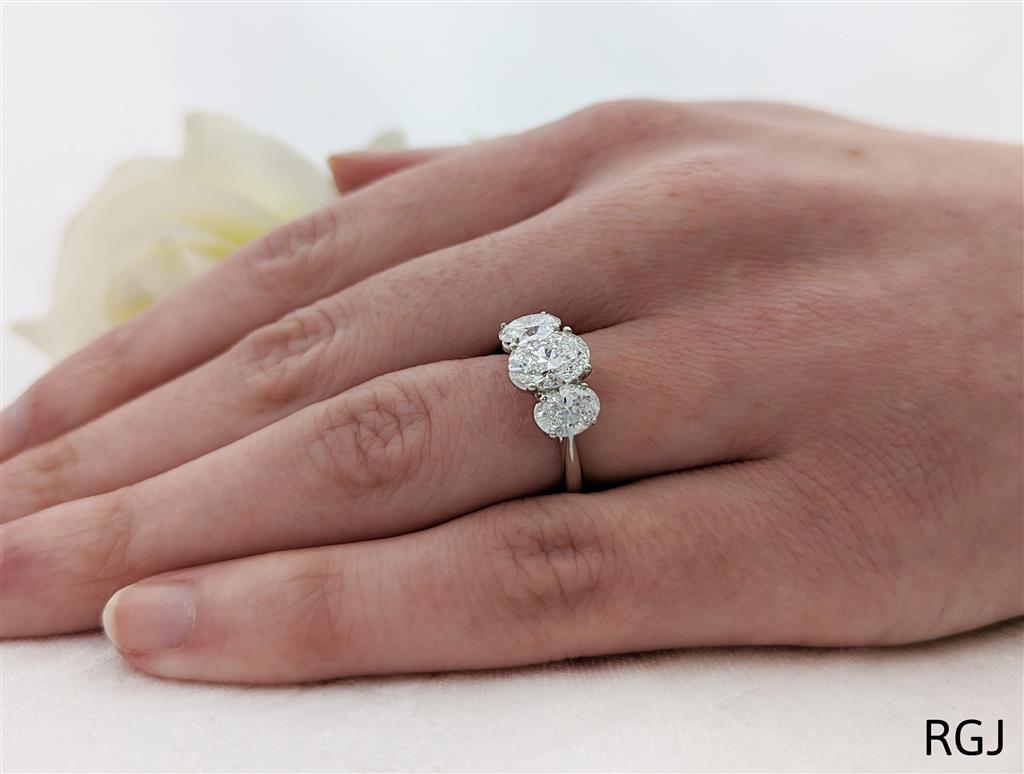 Platinum 3.48ct Oval Cut Laboratory Grown Diamond Three Stone Engagement Ring