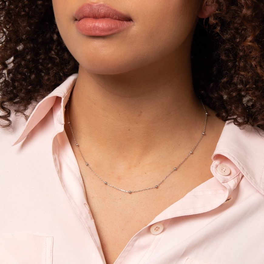 9ct white gold polished ball station necklace model shot