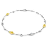 9ct White And Yellow Gold 0.24ct Pear Cut Yellow Diamond And 0.05ct Diamond Station Bracelet