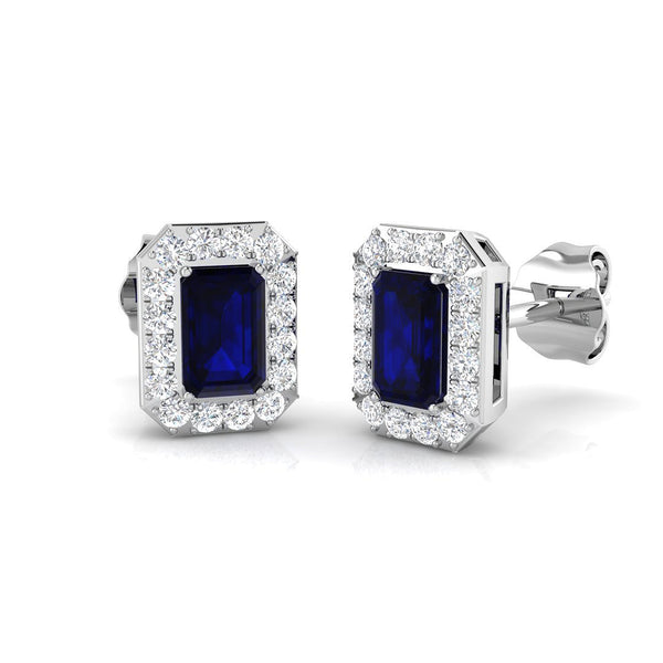 18ct White Gold 0.64ct Emerald Cut Blue Sapphire And 0.18ct Diamond Halo Stud Earrings