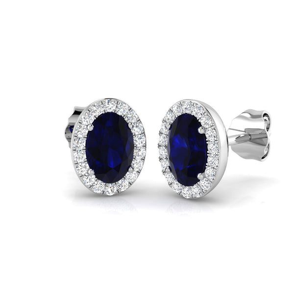 18ct White Gold 1.20ct Blue Sapphire And 0.18ct Diamond Halo Stud Earrings