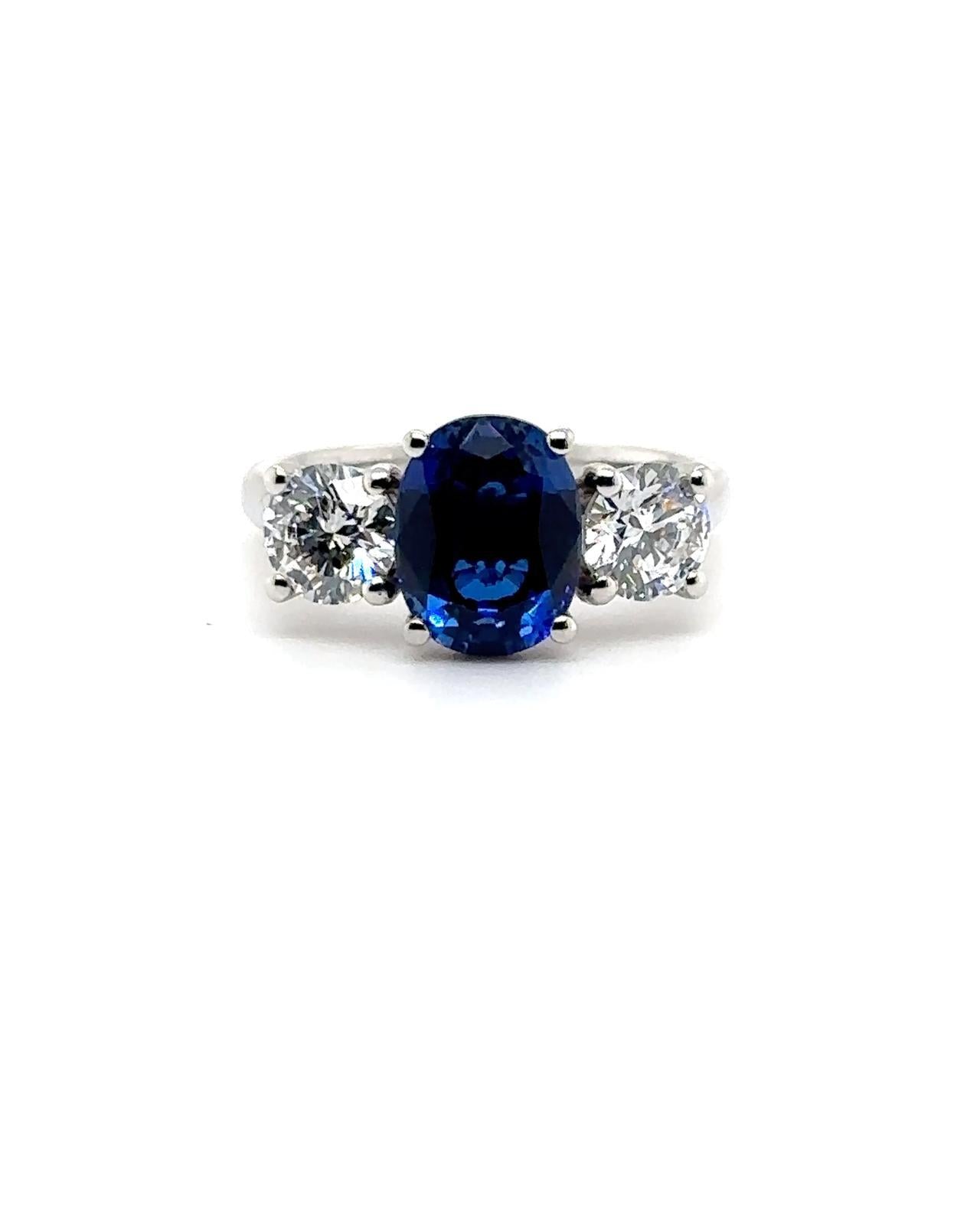 Platinum 2.60ct Blue Sapphire And 1.10ct Diamond Laboratory Grown Three Stone Ring