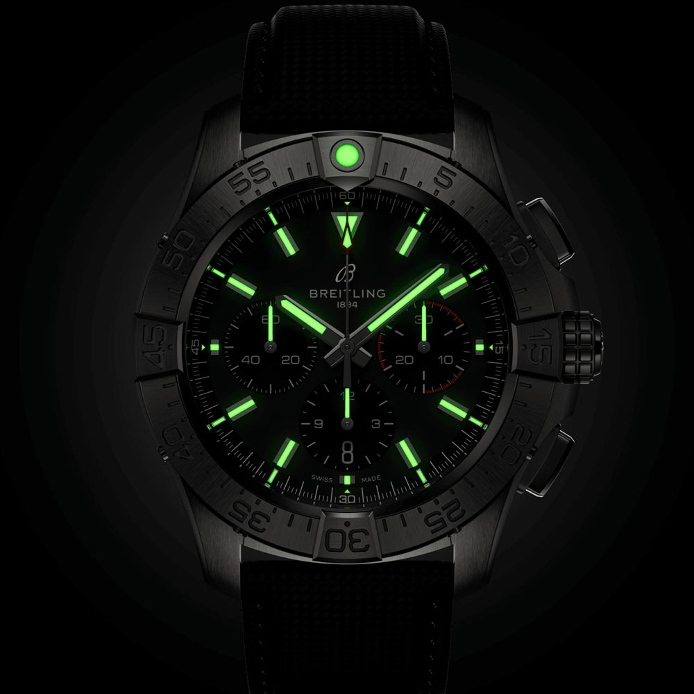 breitling avenger b01 44mm black dial automatic chronograph steel on leather bracelet gents watch front facing upright in the dark image
