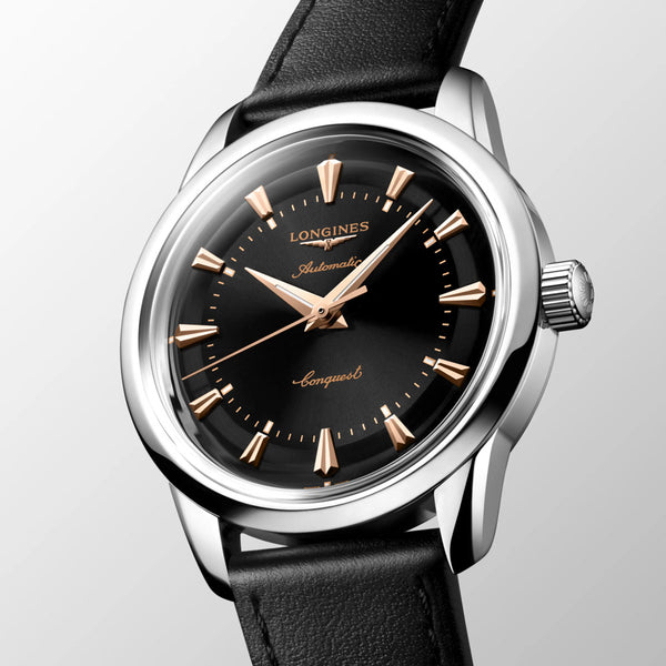longines conquest heritage 38mm black dial stainless steel automatic watch on a black leather strap front side facing image