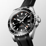 longines hydroconquest gmt 41mm black dial stainless steel automatic gents watch on a black rubber strap front side image