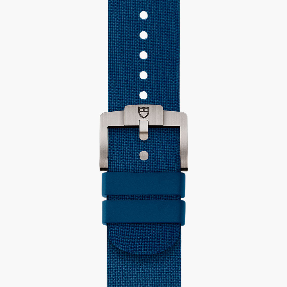 tudor pelagos fxd 42mm blue dial automatic titanium on fabric strap watch showing complimentary blue rubber strap with titanium tang buckle